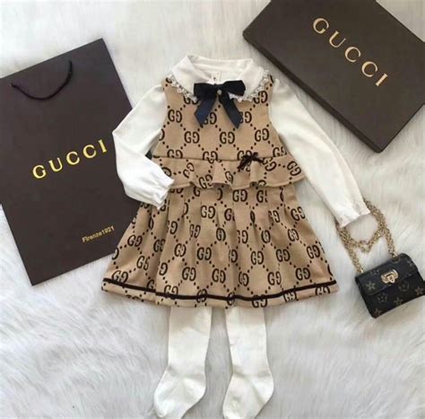 gucci baby girl clothing.